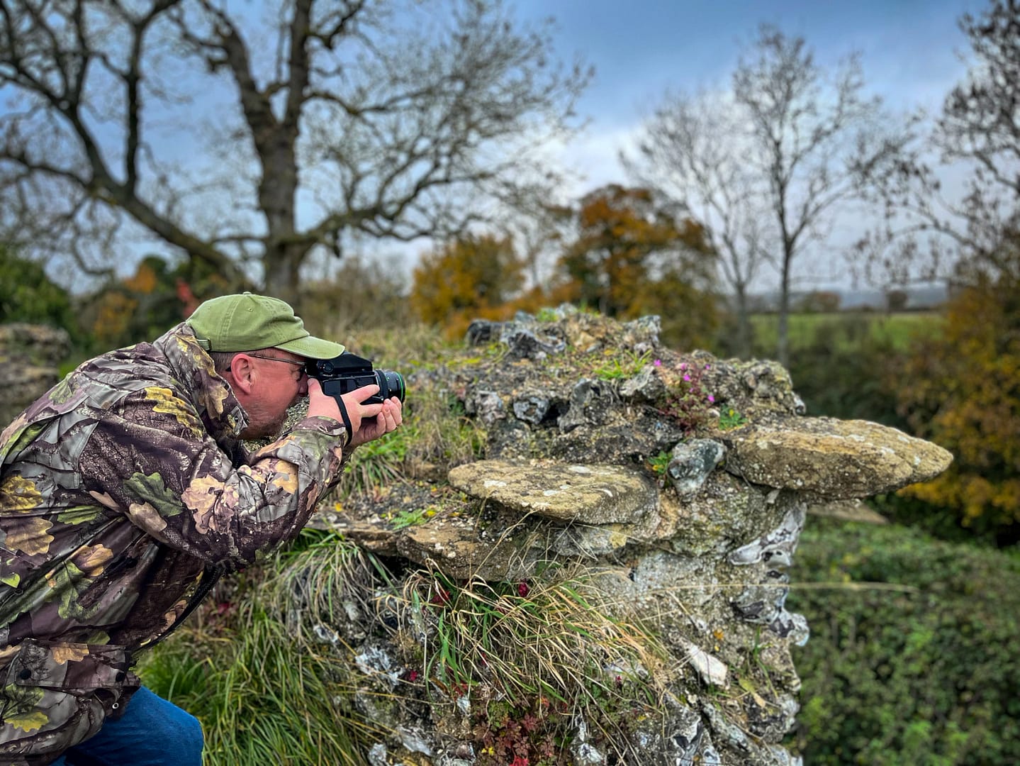 Stephen Paul Young  photographing wild flowers along the Calleva Roman Wall