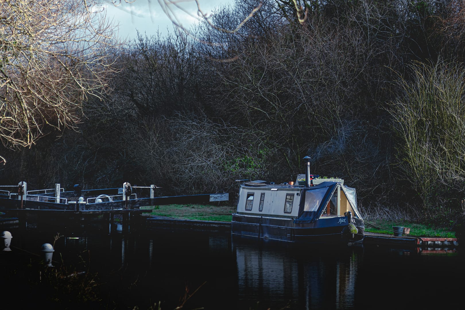 Aldermaston Wharf Winter and a lonely narrow boat by the lock on the Kennet and Avon Canal.