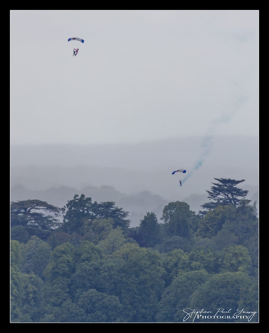 RAF Parachute Display Team jumping into Highclere Castle Show ground.